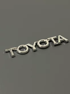 Шильдик TOYOTA на багажник автомобиля