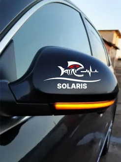 Наклейка на зеркало пиранья Hyundai Solaris 7х15см